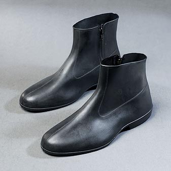 Gummiüberschuh Boot Die Stiefelform schützt besonders effektiv gegen Matsch und Schnee.